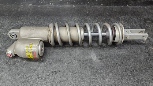 Shock rear suspension